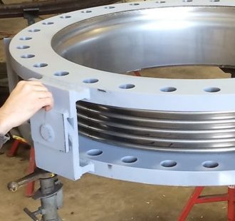 Hinged expansion joint